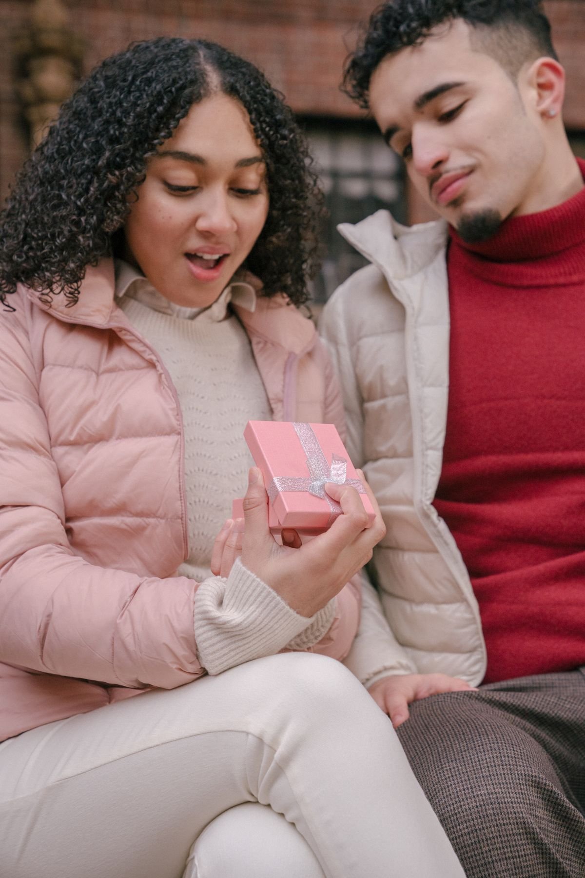 Couple exchanging a personalized gift